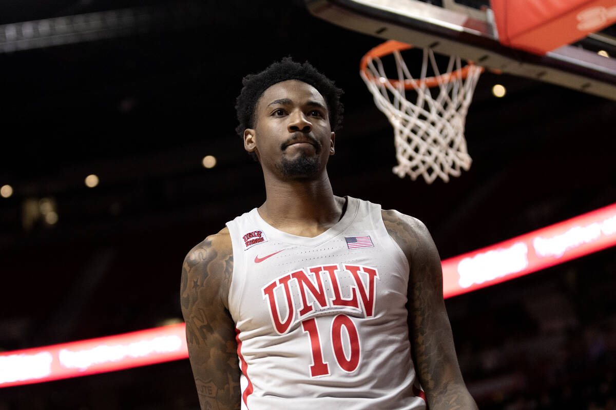 UNLV Rebels forward Kalib Boone (10) reacts after dunking during the second half of an NCAA col ...