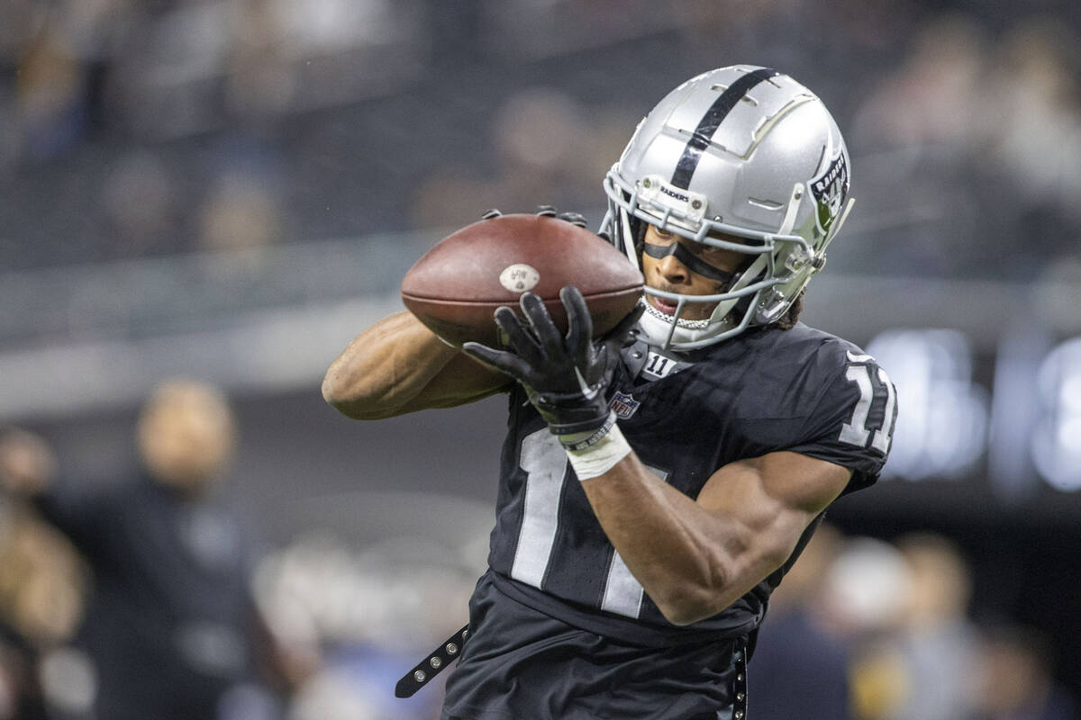 Raiders wide receiver Tre Tucker (11) makes a catch before an NFL game against the Los Angeles ...