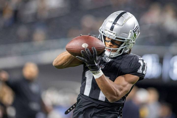 Raiders wide receiver Tre Tucker (11) makes a catch before an NFL game against the Los Angeles ...