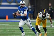 Indianapolis Colts quarterback Gardner Minshew (10) looks to pass under pressure from Pittsburg ...