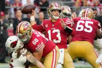 San Francisco 49ers quarterback Brock Purdy (13) throws the ball against the Arizona Cardinals ...