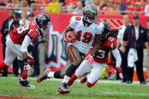 Tampa Bay Buccaneers wide receiver Mike Williams (19) finds room to run between Atlanta Falcons ...