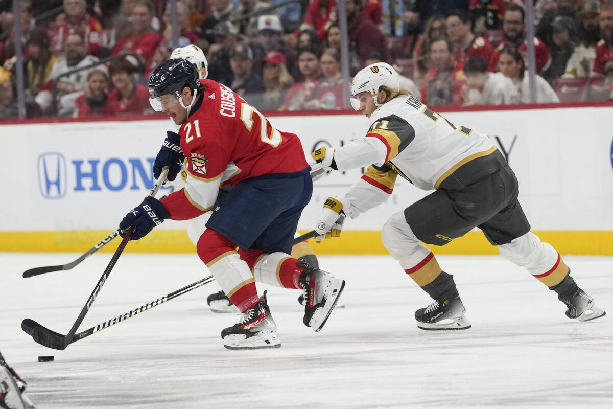Florida Panthers center Nick Cousins (21) skates with the puck as Vegas Golden Knights center W ...