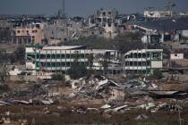 Destroyed farms and buildings in the Gaza Strip as seen from Southern Israel, Friday, Dec. 22, ...