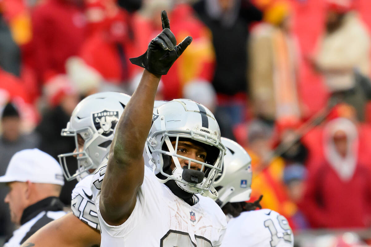 Las Vegas Raiders running back Zamir White celebrates after they beat the Kansas City Chiefs in ...