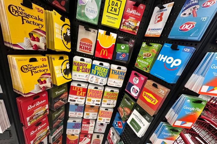 Gift cards are displayed at a Target store, in New York, Thursday, Dec. 21, 2023. Americans are ...