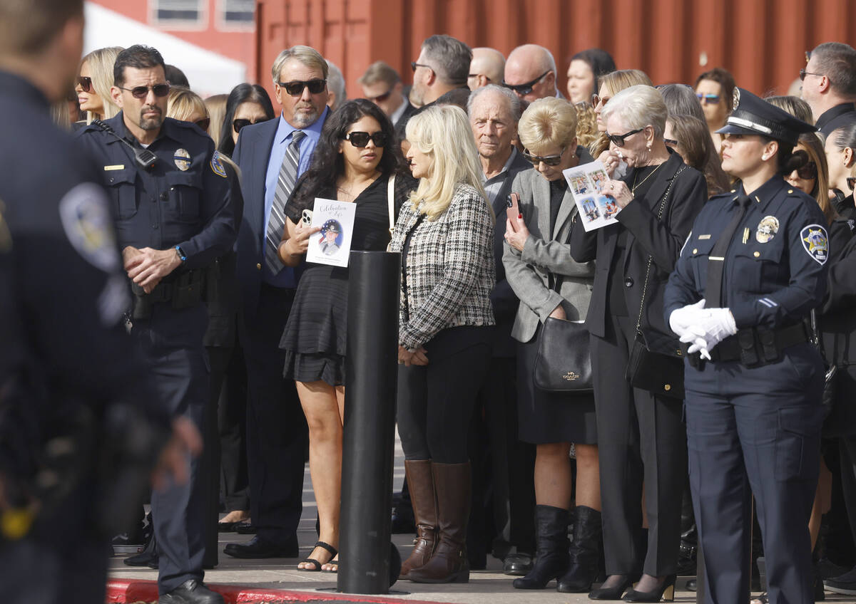 Mourners wait outside of Central Church to attend Nevada Highway Patrol Sgt. Michael Abbate's m ...