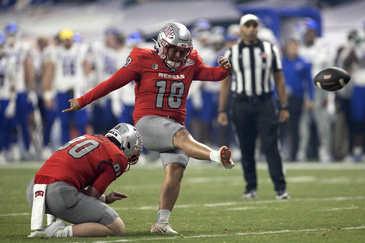 UNLV Rebels place kicker Jose Pizano (18) sends the ball forward for a field goal during the fi ...