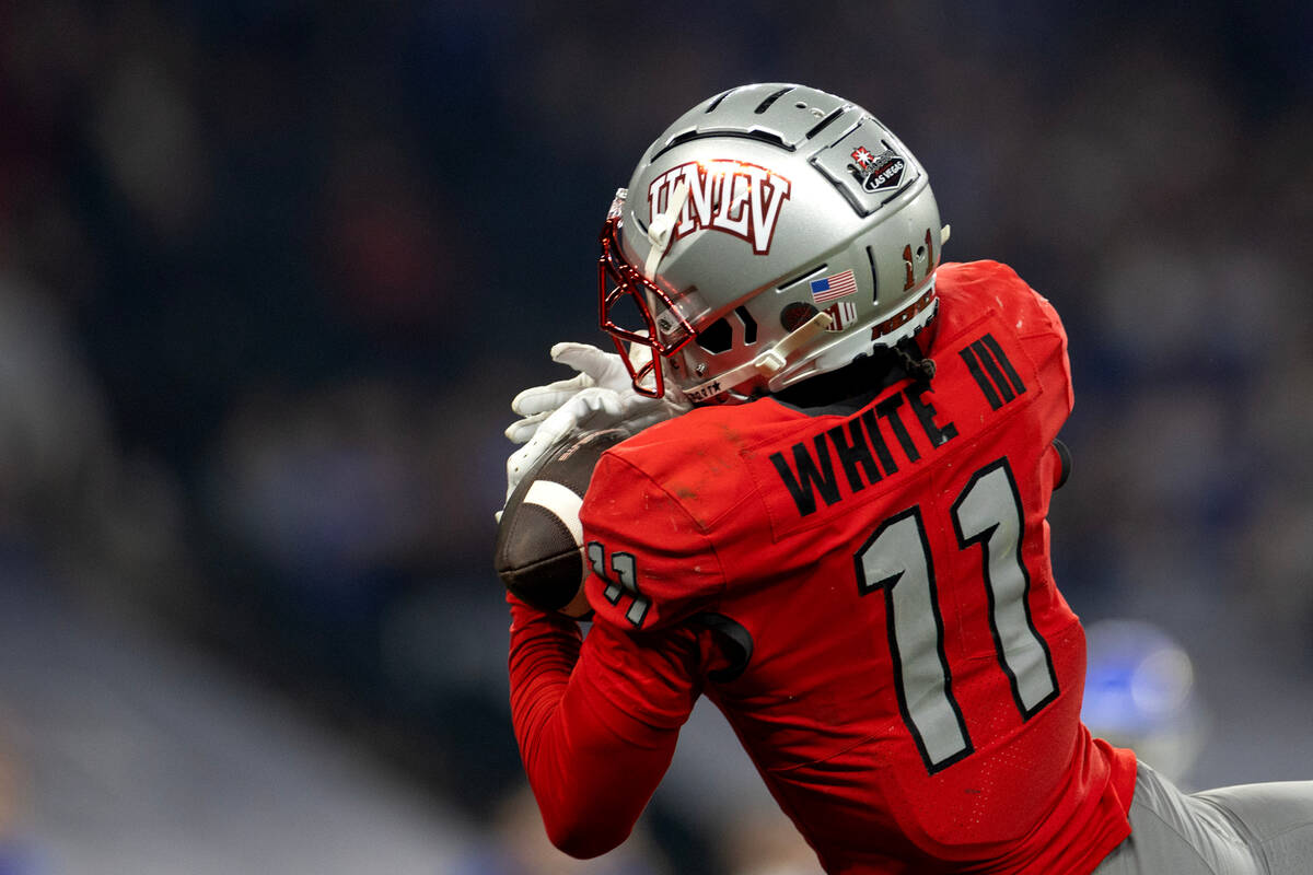 UNLV Rebels wide receiver Ricky White (11) catches a pass for a touchdown during the second hal ...