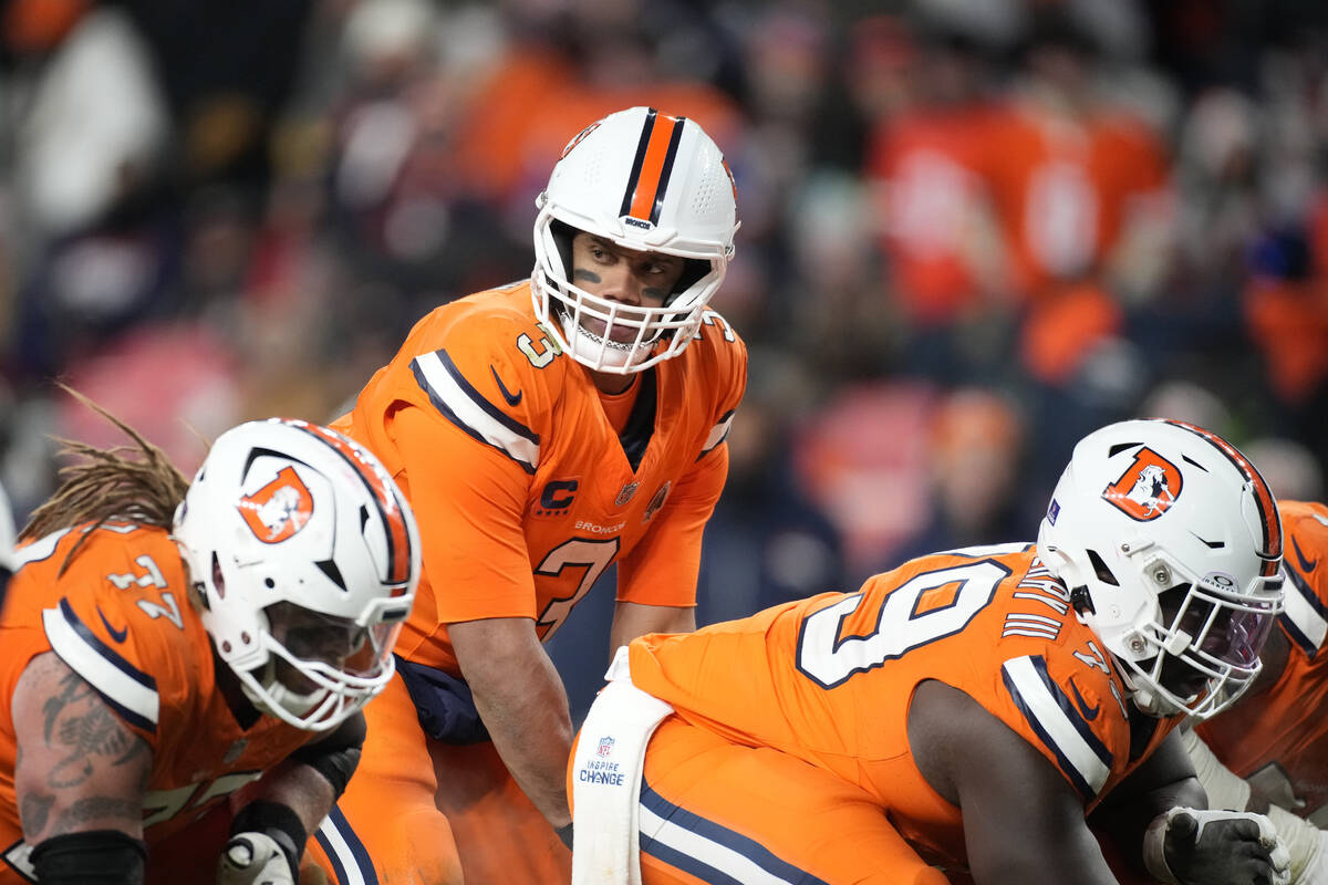 Denver Broncos quarterback Russell Wilson (3) waits on the snap during the second half of an NF ...