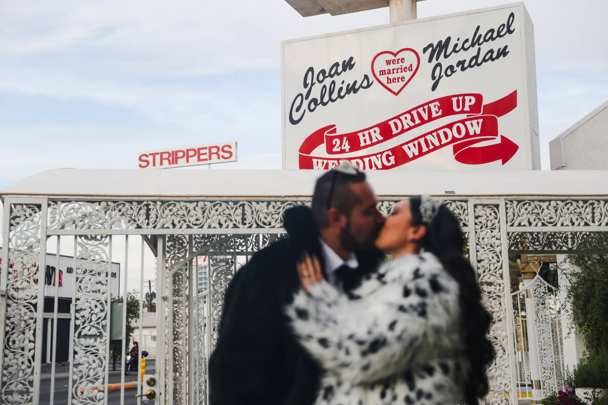 Yvan Devergranne, left, and Samantha Castrejon, right, pose for photos after their wedding at t ...