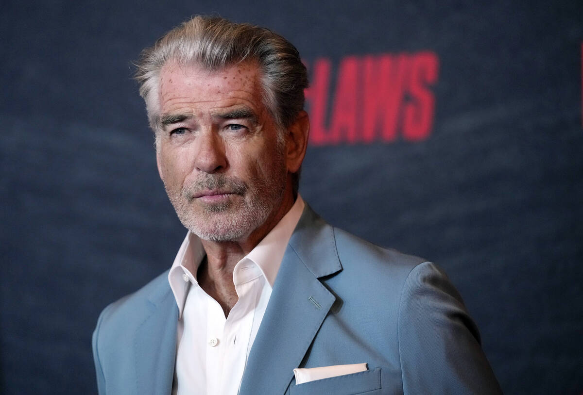 Pierce Brosnan, a cast member in "The Out-Laws," poses at a special screening of the film, Mond ...