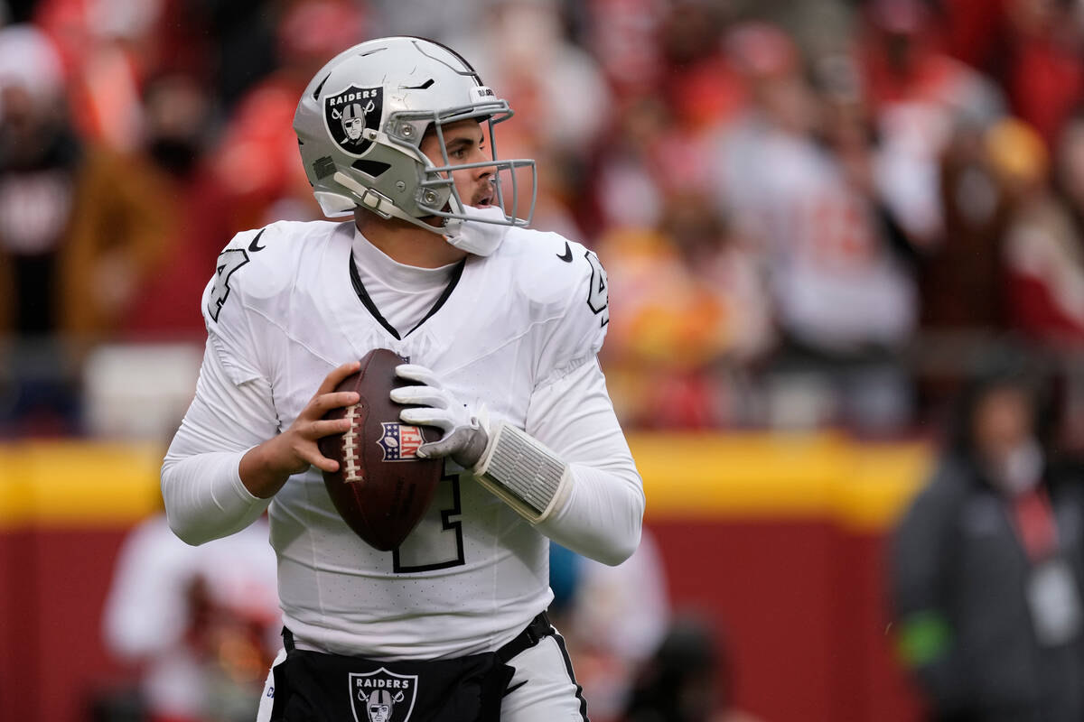 Las Vegas Raiders quarterback Aidan O'Connell looks to pass during the first half of an NFL foo ...