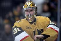 Golden Knights goaltender Logan Thompson (36) readies for the second period of an NHL hockey ga ...