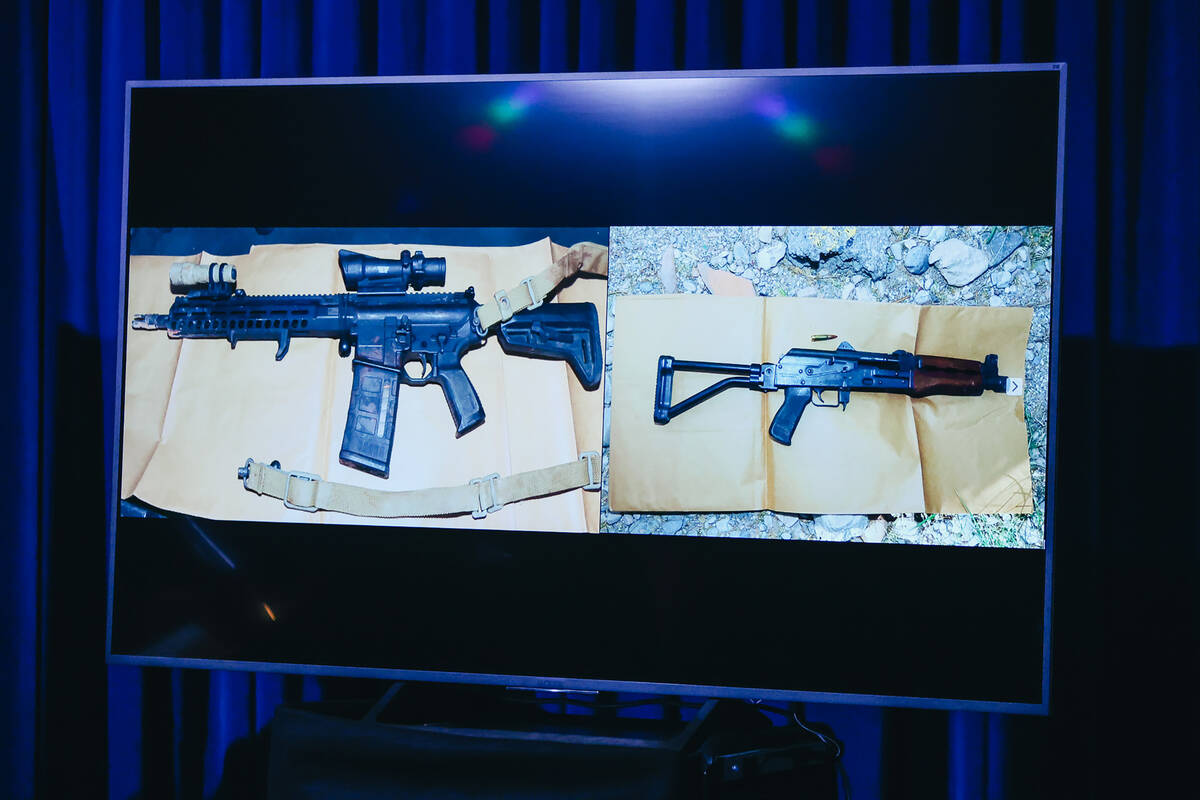 Two rifles used by Justin Davidson are seen in a photograph during a briefing at Metro Headquar ...