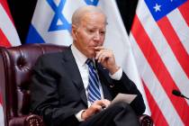 FILE - President Joe Biden listens as he and Israeli Prime Minister Benjamin Netanyahu particip ...