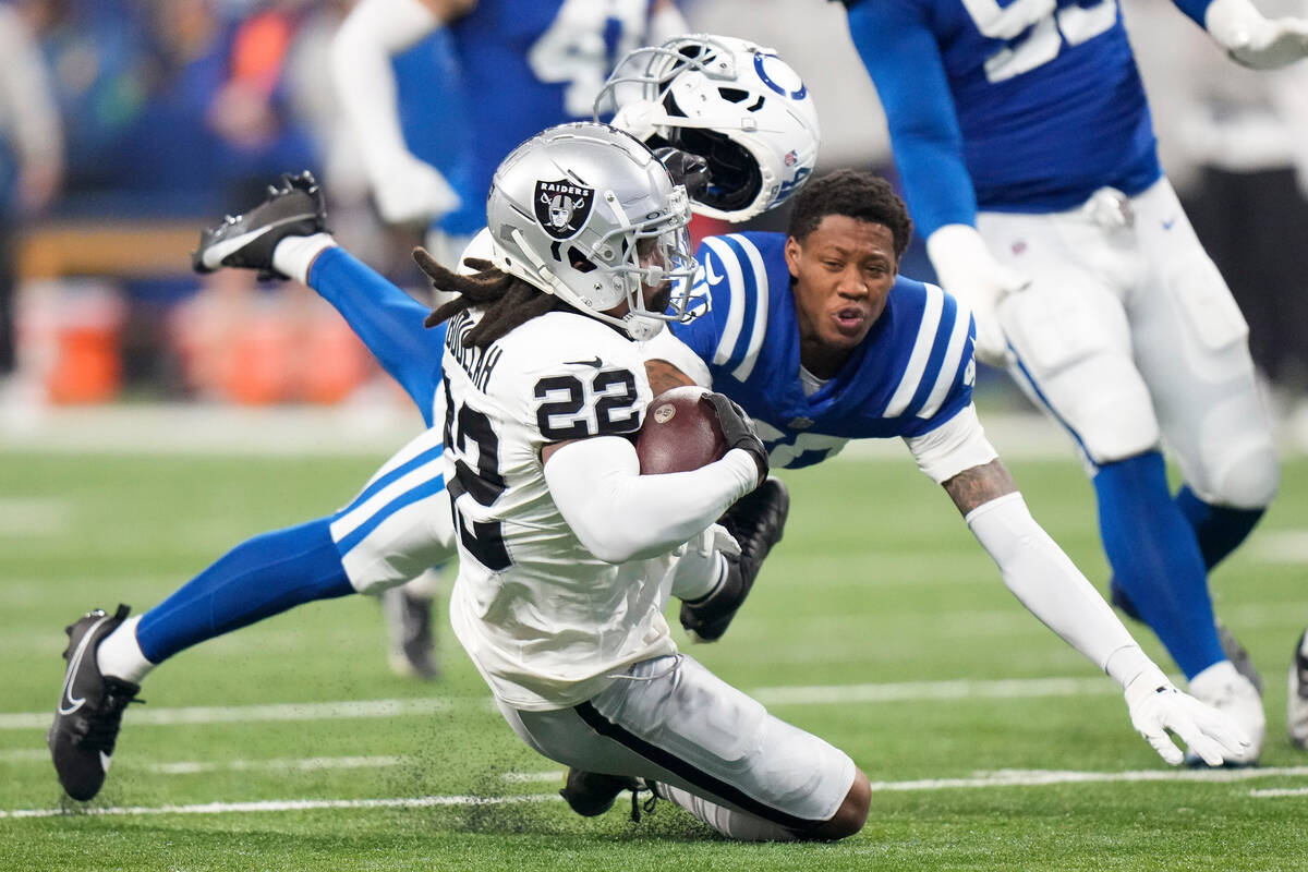 Indianapolis Colts cornerback Jaylon Jones (40) loses his helmet as he tackles Las Vegas Raider ...