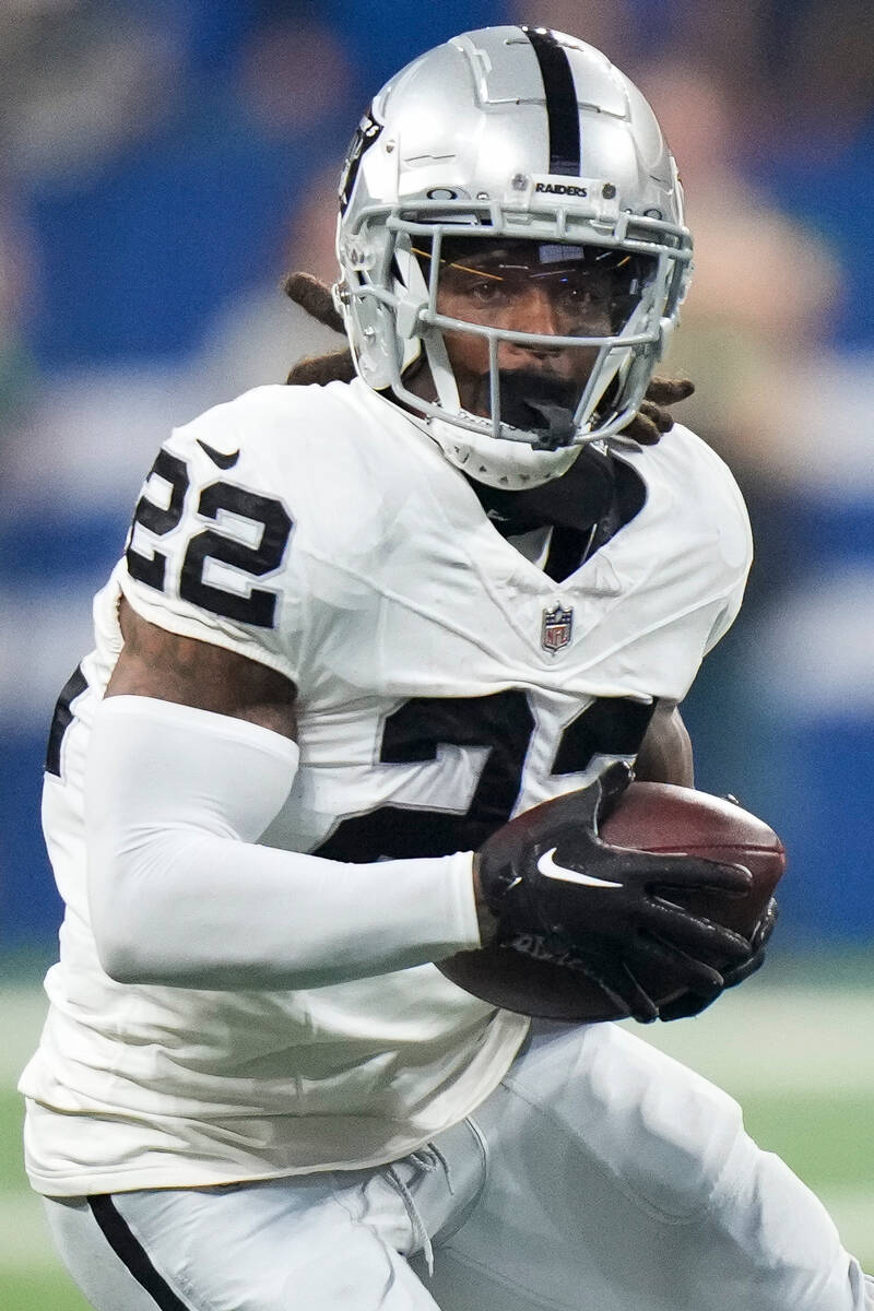 Las Vegas Raiders running back Ameer Abdullah (22) carries during the first half of an NFL foot ...