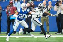 Indianapolis Colts safety Nick Cross (20) breaks up a pass intended for Las Vegas Raiders wide ...