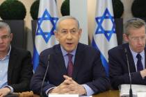 Israeli Prime Minister Benjamin Netanyahu attends the weekly cabinet meeting at the the Kirya m ...