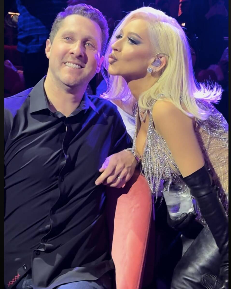 Plaza CEO Jonathan Jossel, left, is shown with pop superstar Christina Aguilera at Voltaire at ...