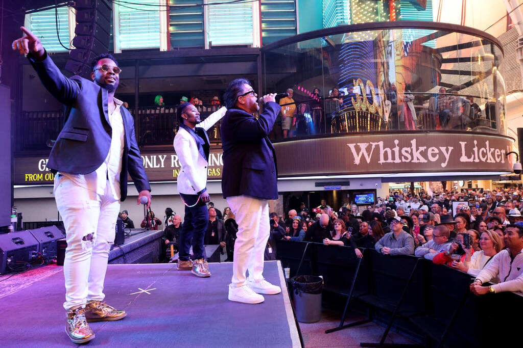 Color Me Badd performs for New Year’s Eve revelers on the First Street Stage during the ...