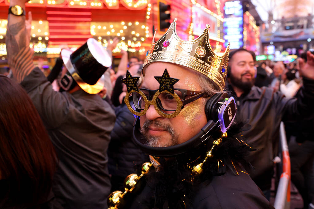 New Year’s Eve revelers dance in the silent disco during the Time of Your Life Festival ...