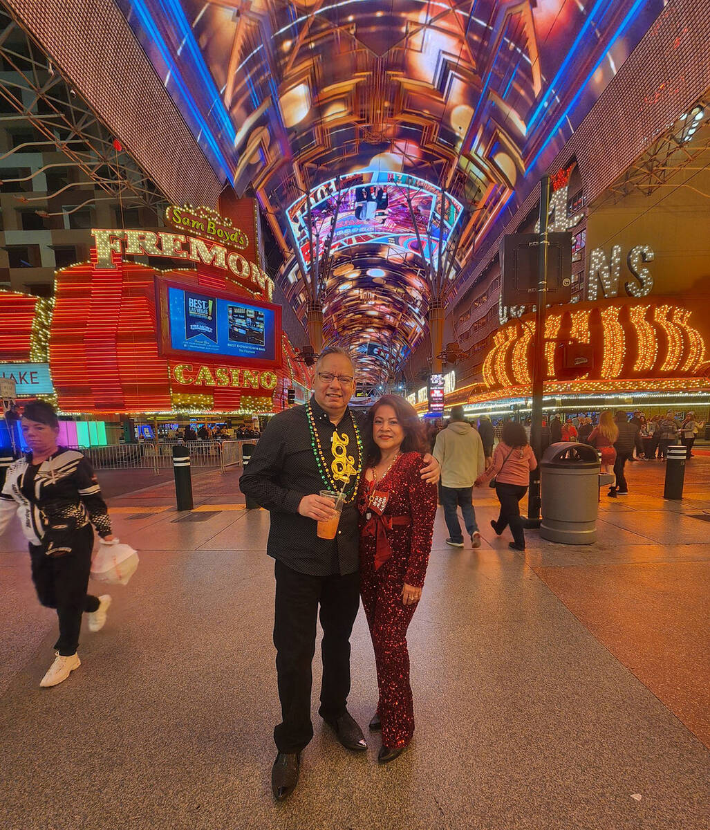 Dick Ochoa and Kelly Vilamar, residents of Los Angeles, on Fremont Street for New Year's Eve 20 ...