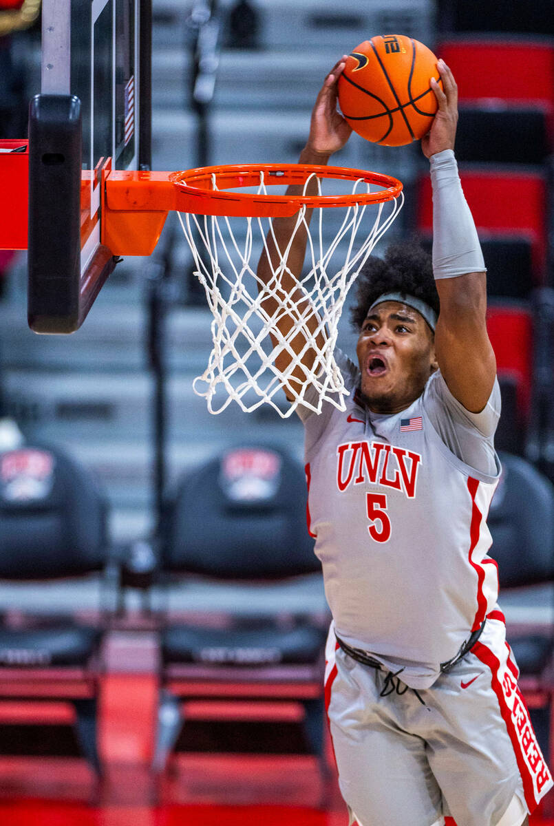 UNLV Rebels forward Rob Whaley Jr. (5) dunks over the Bethesda University Flames during the sec ...