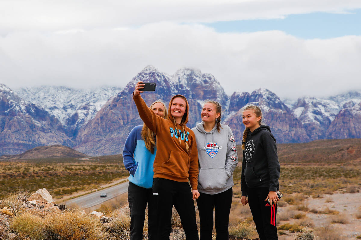 Tara, from left, Makenna, Myana, and Melody Stock, visiting from Washington, take a selfie in f ...
