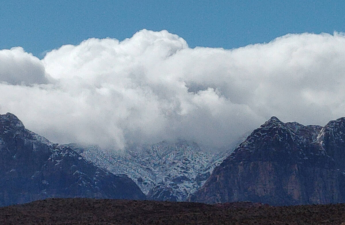 Snow on the foothills of the Spring Mountains just west of Summerlin after a morning storm on W ...