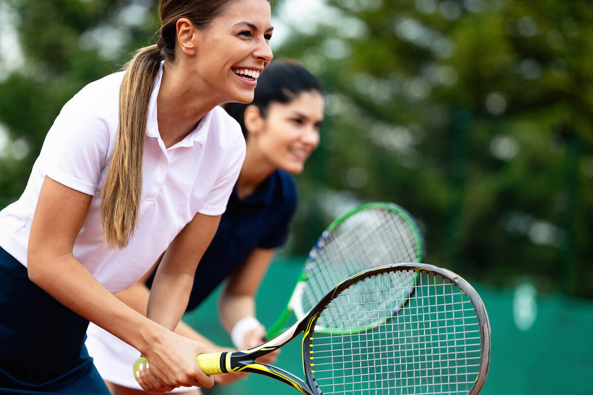 Having a workout buddy can help make exercise fun and easy. (Getty Images)