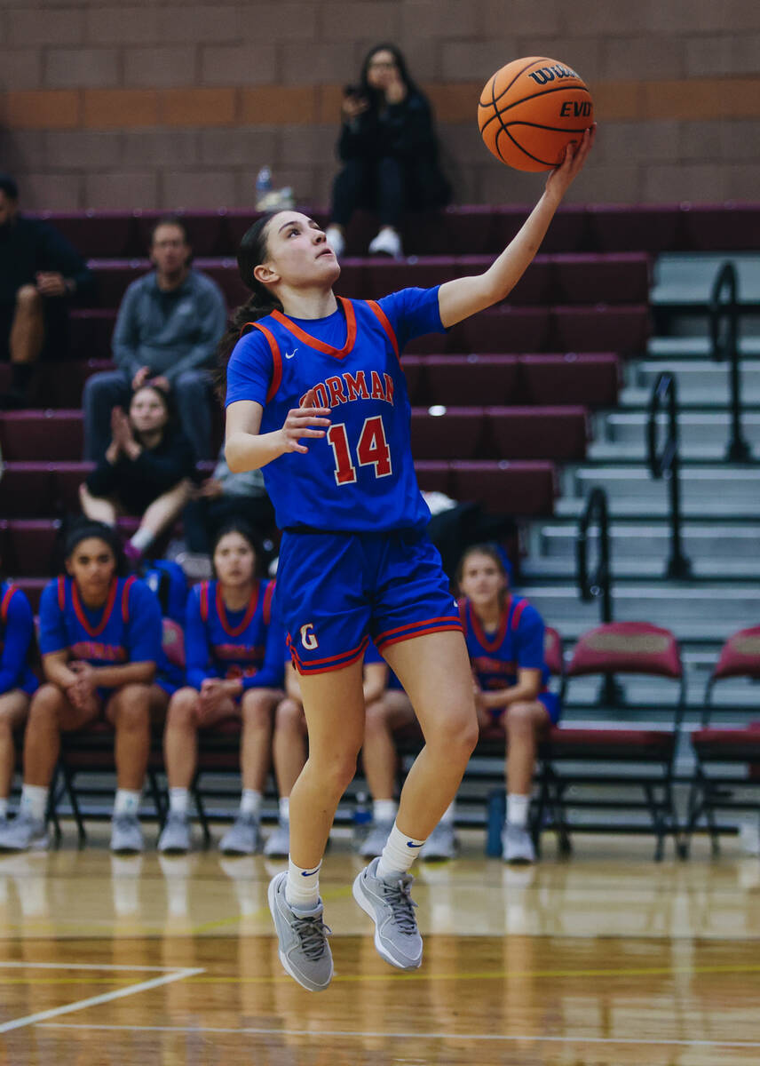 Bishop Gorman point guard Kenzee Holton goes for a layup during a game at Faith Lutheran on Wed ...