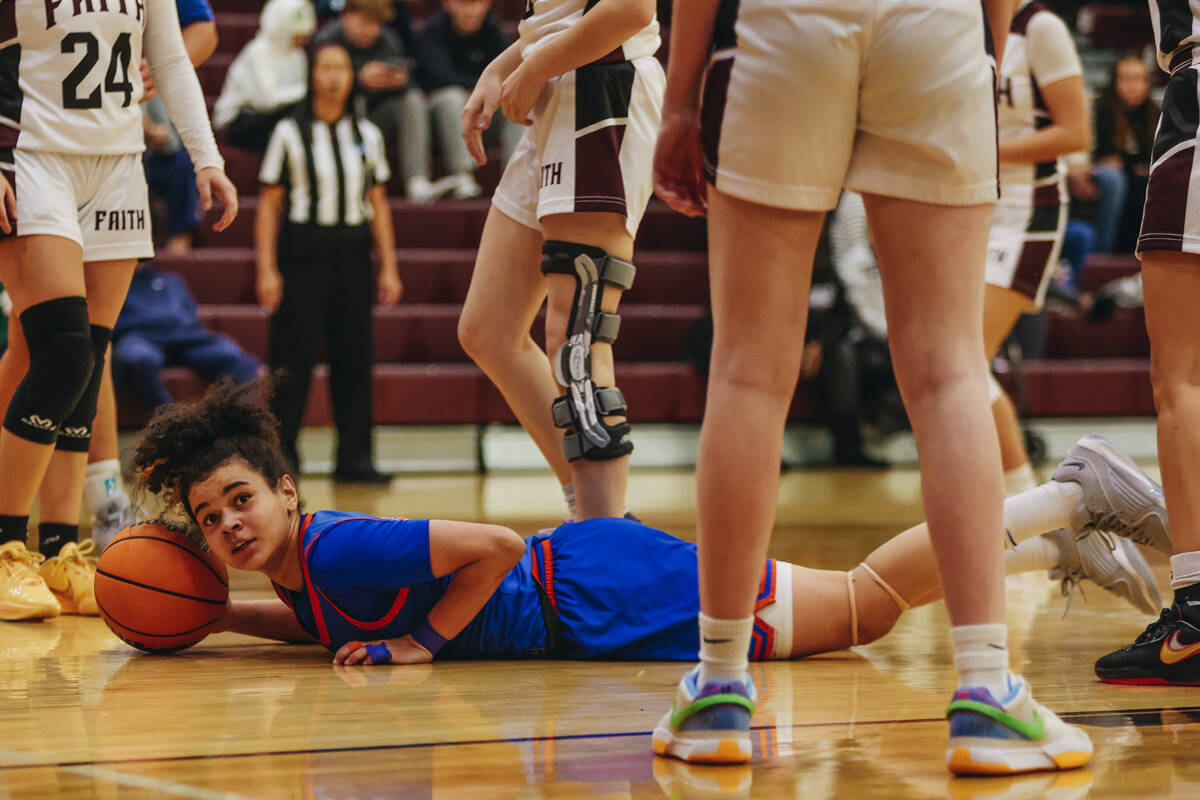 Bishop Gorman point guard Aaliah Spaight (10) looks to the referee after getting fouled on by a ...