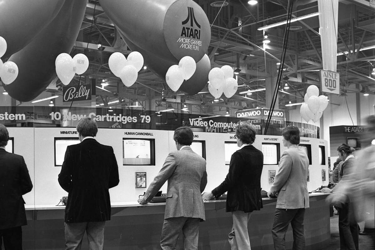 Attendees play Atari video games during the 2nd International CES show January 6, 1979, at the ...