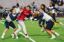 Liberty flag football wide receiver Brinlee Yurek gets her flags pulled during a game against S ...