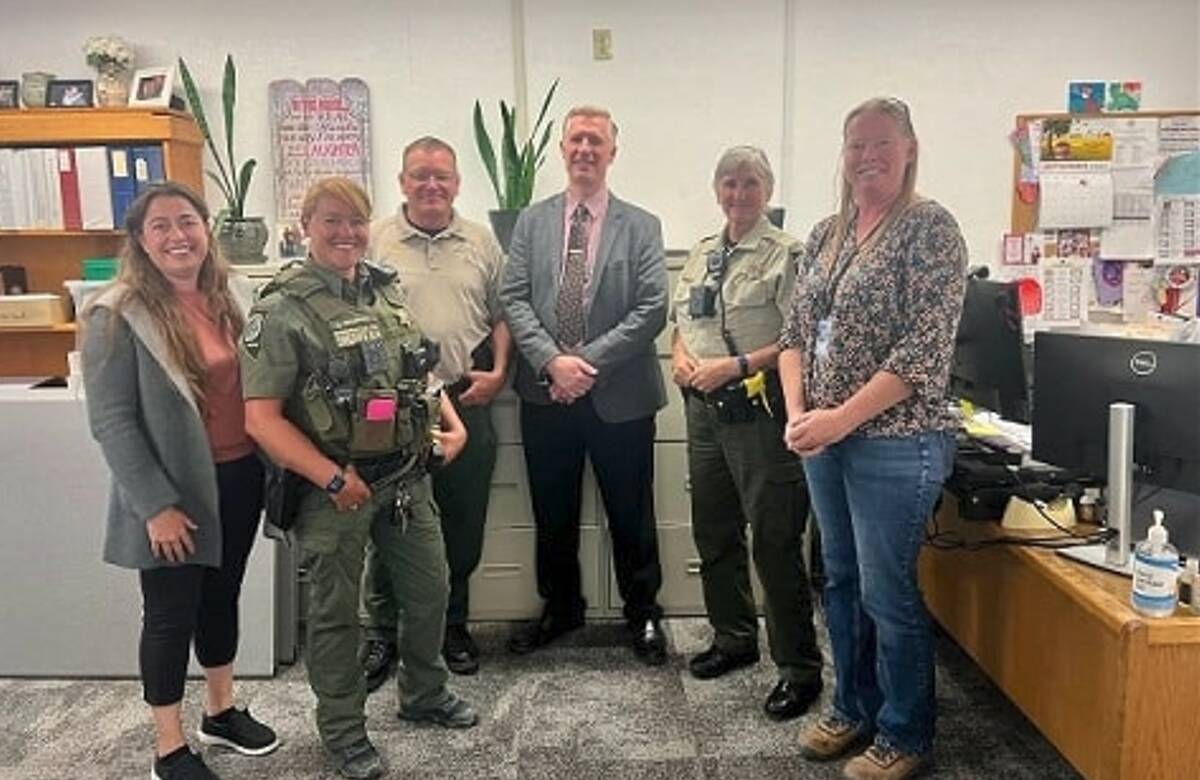 Esmeralda County Sheriff Nicholas Dondero, third from left, poses with members of the staff of ...