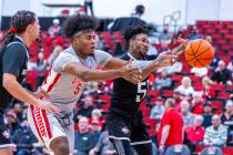 UNLV Rebels forward Rob Whaley Jr. (5) and Bethesda University Flames guard Tawrence Shoffner ( ...