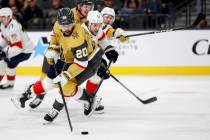 Vegas Golden Knights center Chandler Stephenson (20) handles the puck against the Florida Panth ...