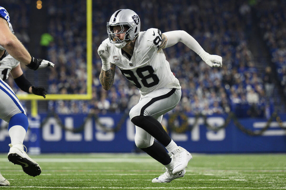 Las Vegas Raiders defensive end Maxx Crosby (98) rushes off the edge during an NFL football gam ...