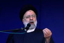 Iranian President Ebrahim Raisi speaks during the funeral ceremony of the victims of Wednesday' ...