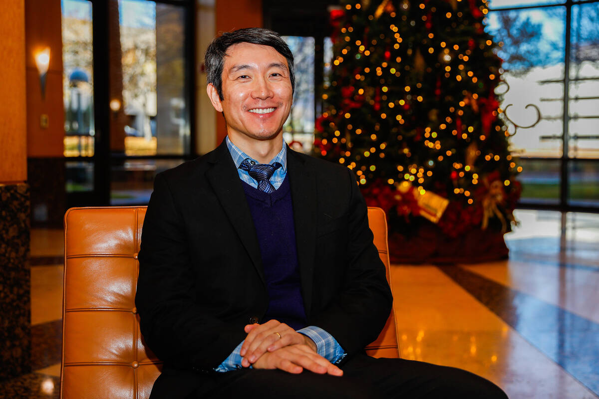 Meng Zhong, Pro Bono Attorney of the Year as honored by the Legal Aid Center, sits outside of h ...