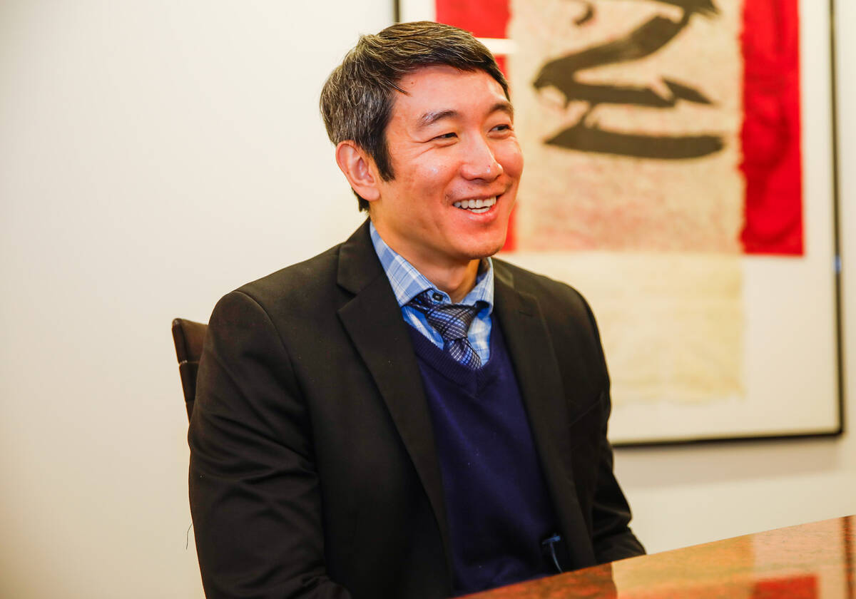 Meng Zhong, Pro Bono Attorney of the Year as honored by the Legal Aid Center, speaks with the L ...