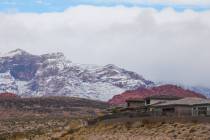 Homes in Summerlin get a view of Red Rock Canyon in the snow on Wednesday, Jan. 3, 2024, in Las ...