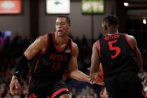San Diego State forward Jaedon LeDee (13) hands the ball to guard Lamont Butler (5) during the ...