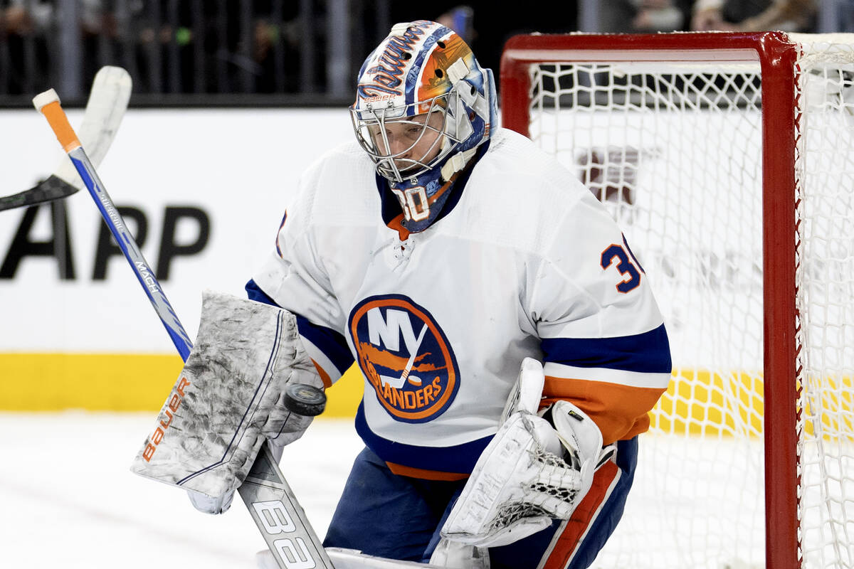 Islanders goaltender Ilya Sorokin (30) saves the puck during the first period of an NHL hockey ...