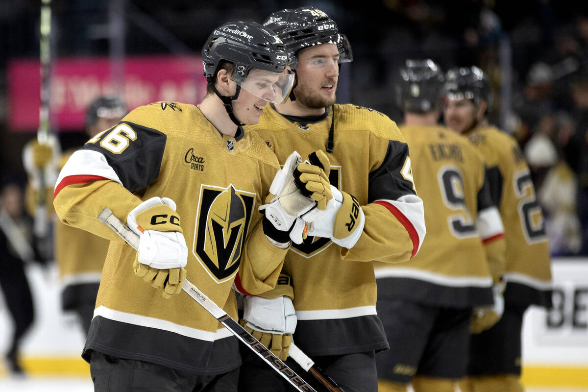 Golden Knights left wing Pavel Dorofeyev (16) and center Ivan Barbashev (49) celebrate their wi ...