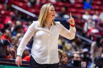 UNLV Lady Rebels head coach Lindy La Rocque calls a play to her players on the court against th ...