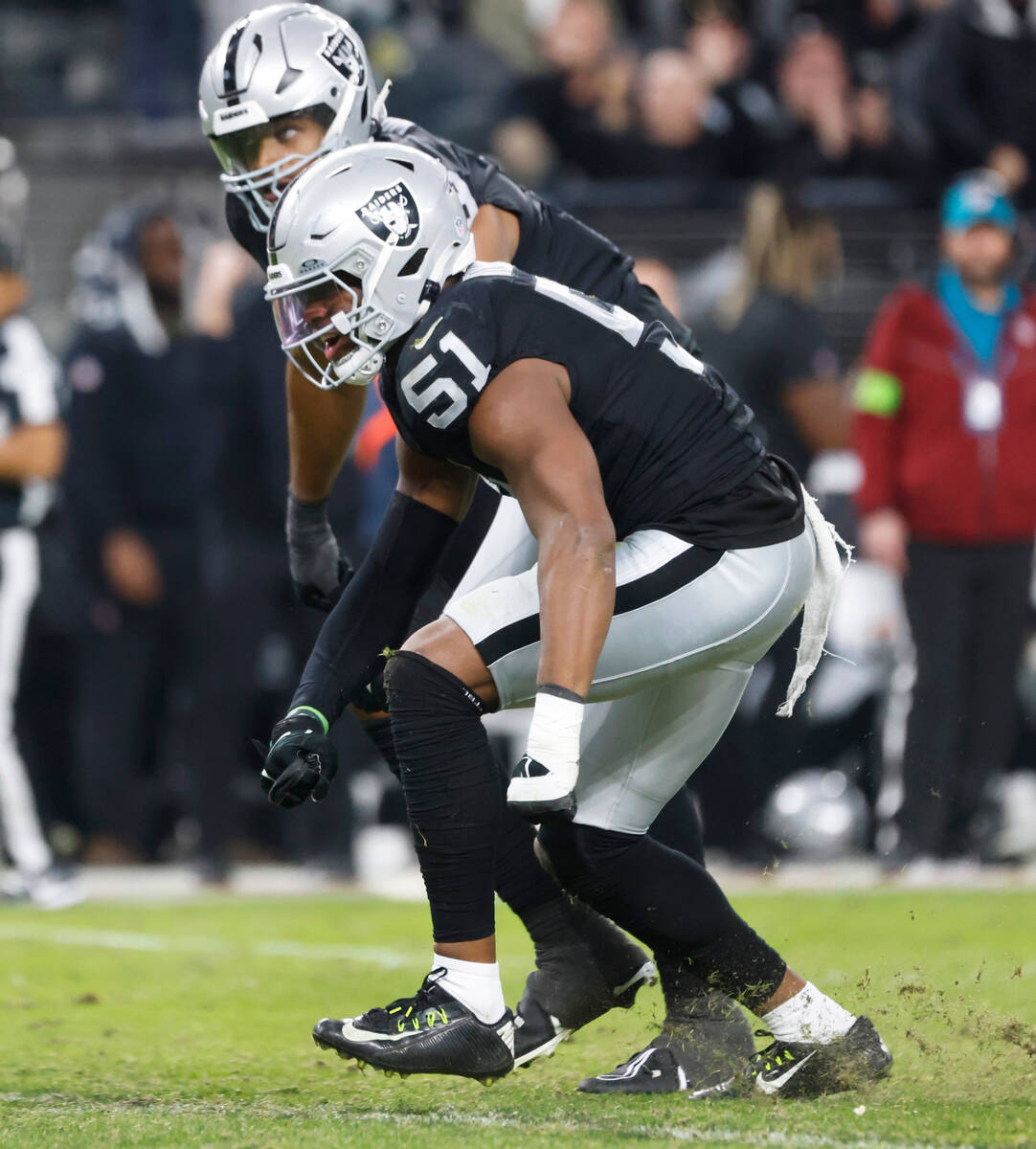 Raiders defensive end Malcolm Koonce (51) reacts after sacking Denver Broncos quarterback Jarre ...
