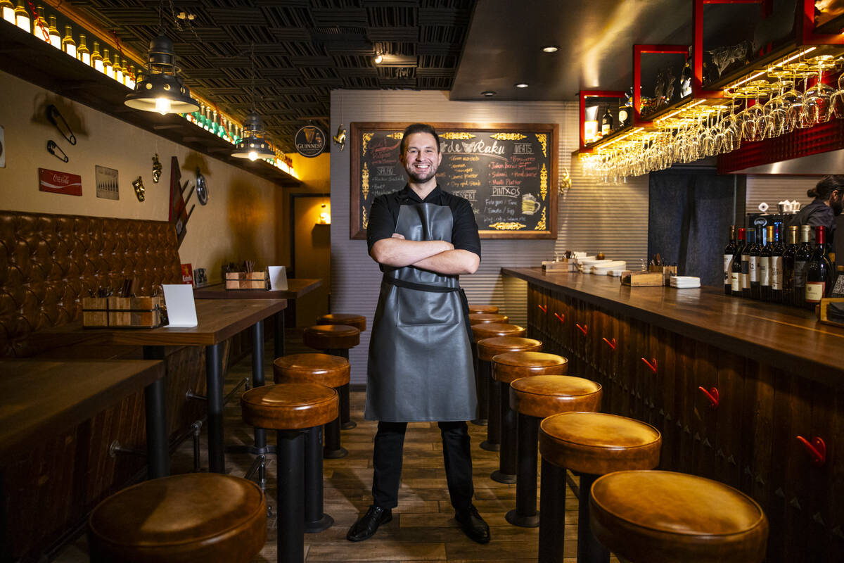 Cameron Mackintosh-Stewart, general manager of Casa de Raku, a tapas bar and restaurant, poses ...